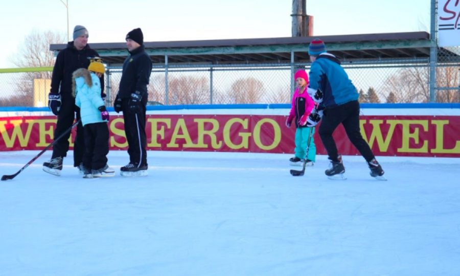 Visitors enjoy Indianola’s new ice skating rink after colder temperatures finally set in. Photo by Coby Berg/The Simpsonian