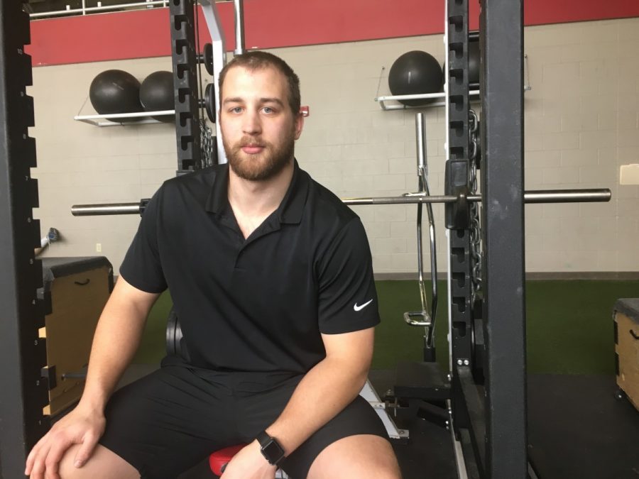 There is a new face in the weight room: Craig Konrardy, the new assistant strength and conditioning coach. Konrardy played baseball at Coe College and has interned with Baylor University as a football strength intern. Photo by Gunnar Davis/The Simpsonian