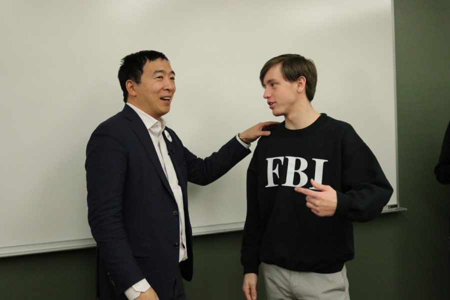 President of Simpson Democrats Geoff Van Deusen speaks to Andrew Yang after the candidates campus event Thursday night. Photo by Coby Berg/The Simpsonian