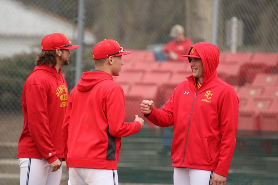 Senior baseball manager Steve Carlson (middle) is a critical key in keeping the team ticking. /photo contributed by Steve Carlson.