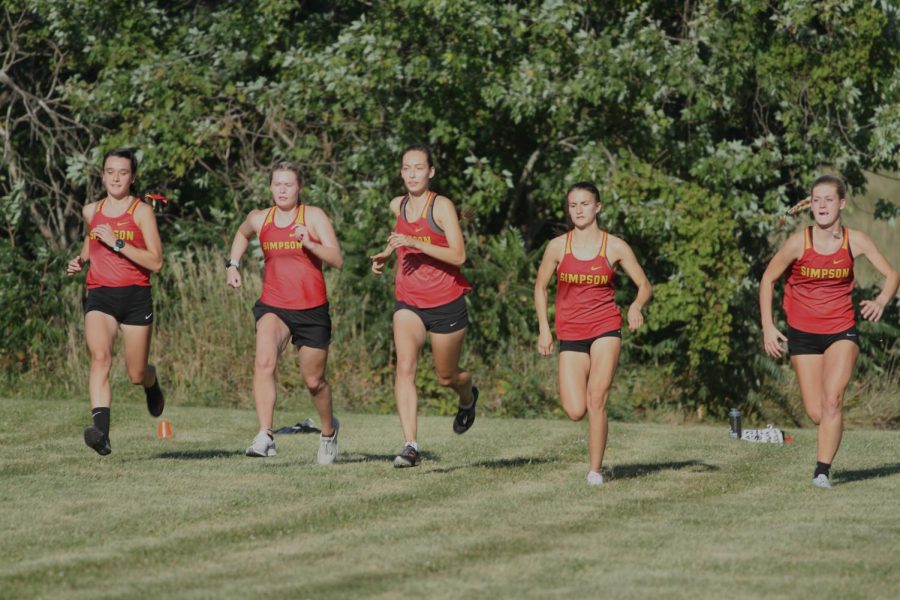 Womens cross country team races to the finish line.