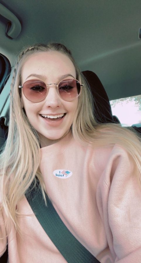Kylie Potratz poses with voting sticker.