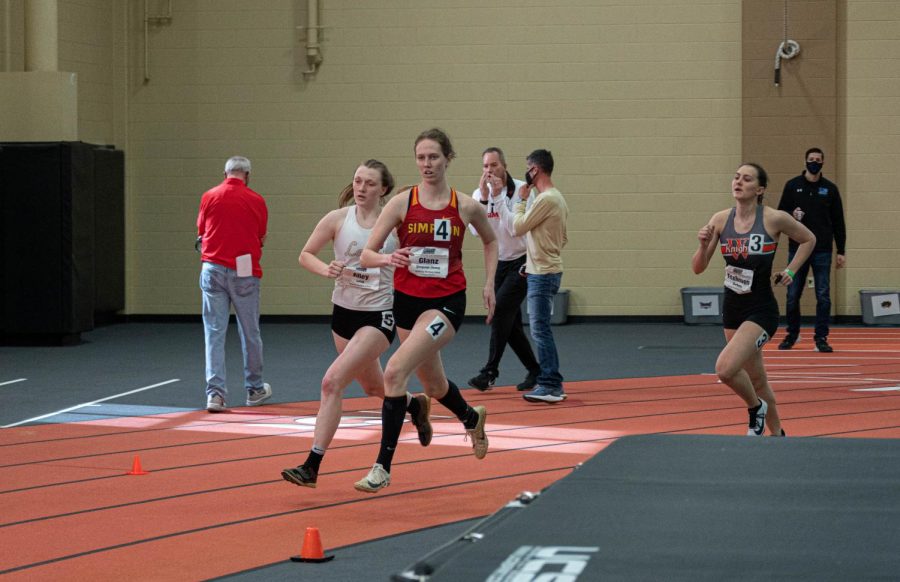 Glanz cruises around the corner during a sprint at Wartburg. The athlete and student coach was one of six Storm members in the indoor season to earn all-region honors.