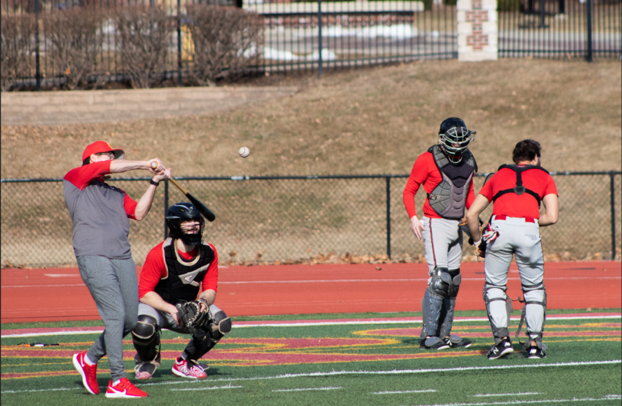 The Simpson baseball team practices on Bill Buxton Field with a pop fly drill. 
