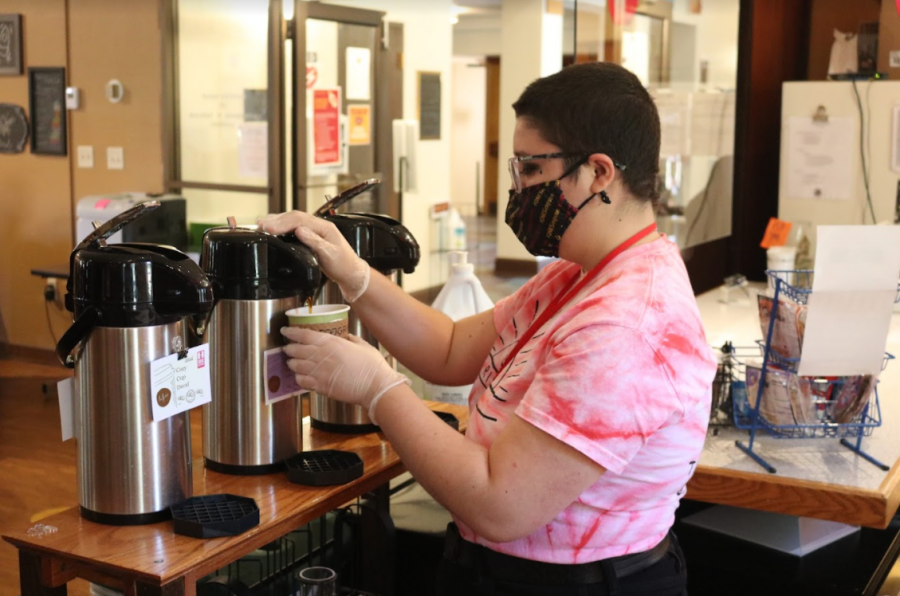 Barista and Holy Grounds manager Eden Moad pours a cup of coffee. Holy Grounds has new locally sourced beans this semester.