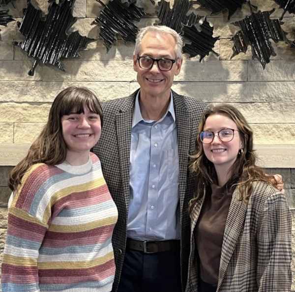 SGA president Sarah Roberts (left) and Vice president Ilianna Murphy (right) with Simpson College president Jay Byers (middle)