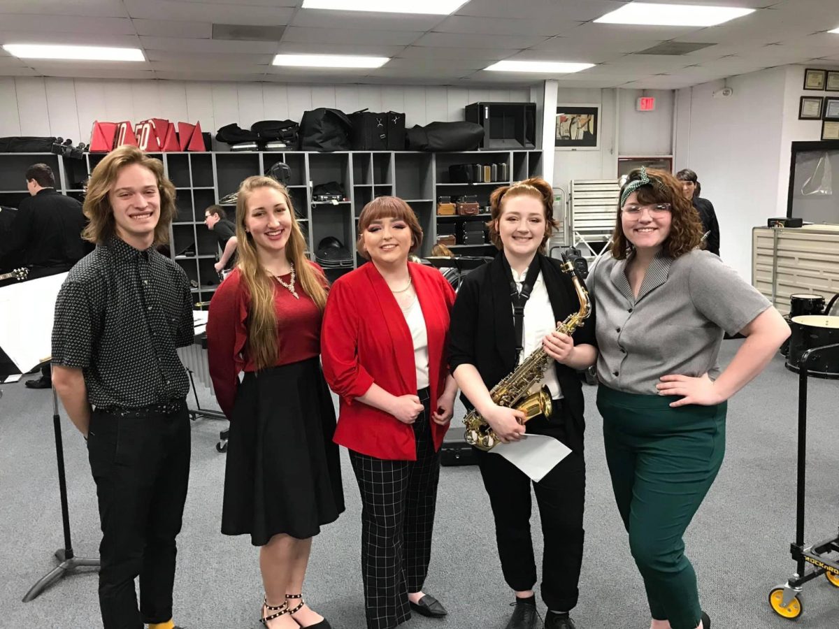 Hinkle and her friends from Winfield-Mount Union High School after a band concert
