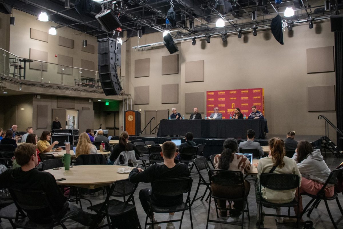 Simpson students gather in Black Box to listen to panelists reflect on the election and share their outlook on the future of another Trump presidency.