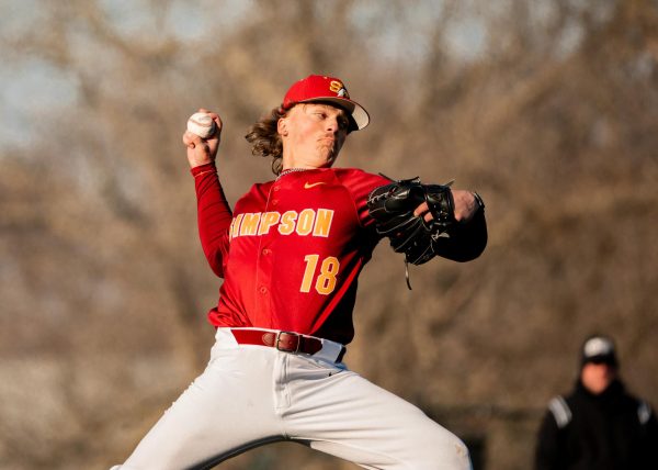 Pitcher Easton Dunwoody throwing in the second game vs St. Olaf on Sunday March 2.