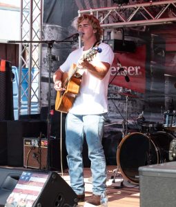 Aiden Flathers performing at the Iowa State Fair Bud Tent this summer