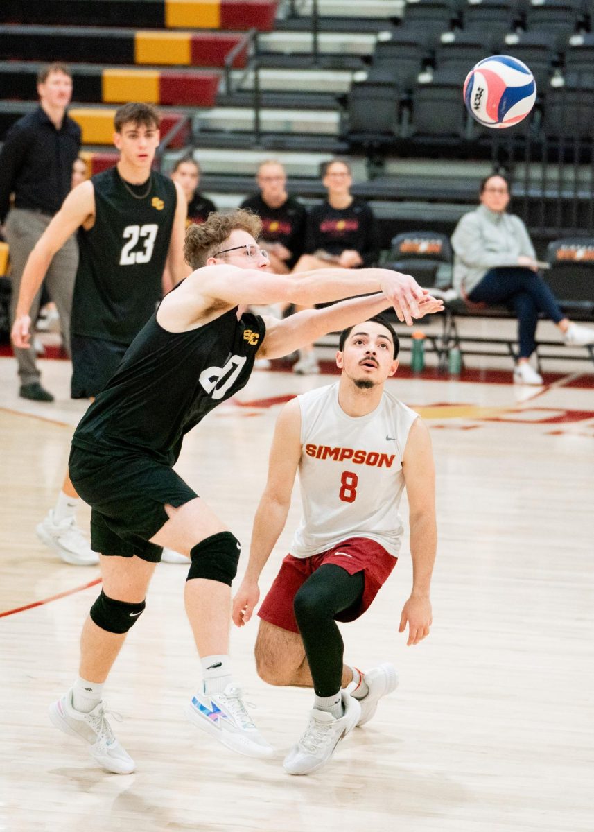 Spencer Krantz goes after a ball against Ottawa University on March 27, 2025
