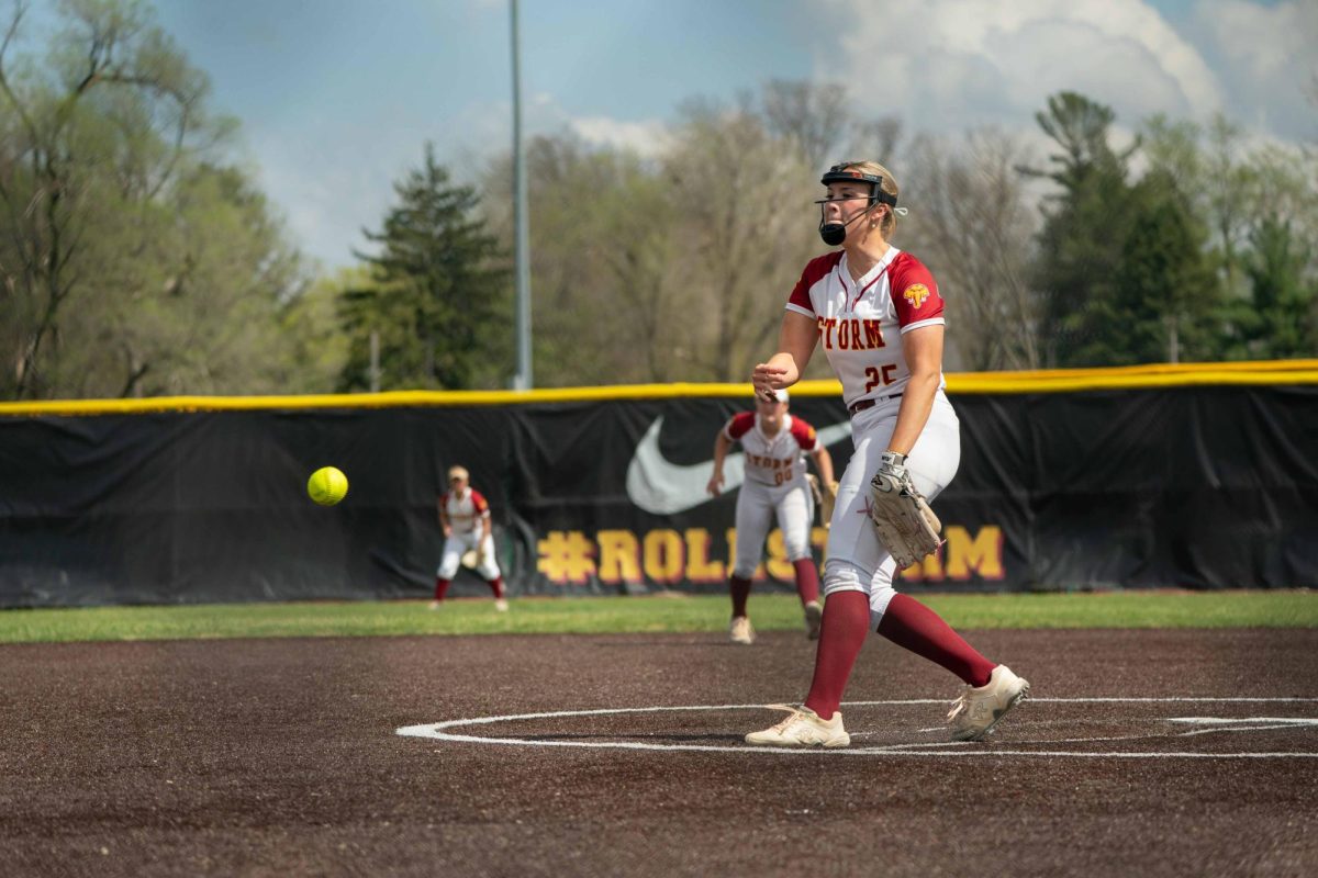 Senior Emma LaFave pitches