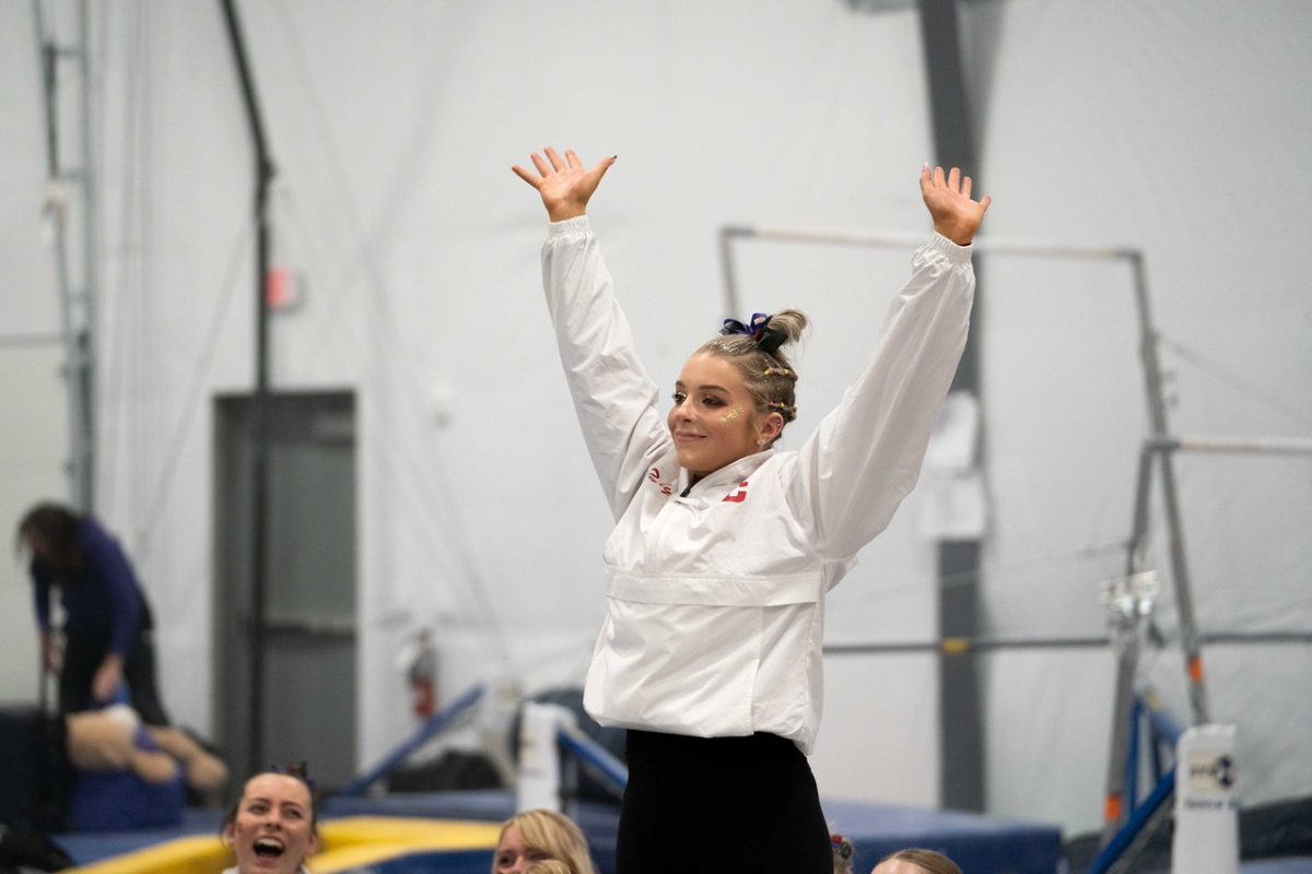 Senior Kaelyn Tally at a home competition in Fiterman Training Center